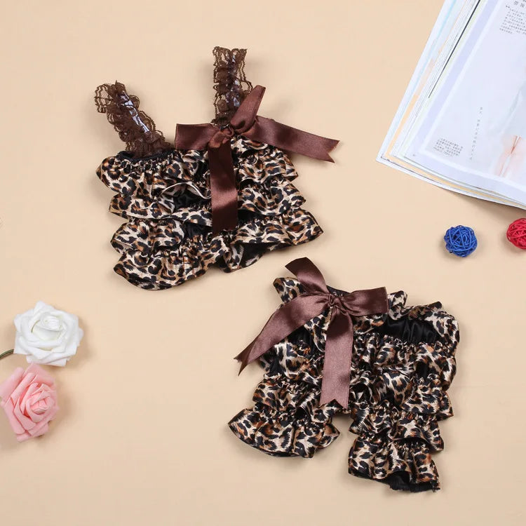 Hot Selling Toddler Fashion Summer Leopard Satin Costume Sling Ruffle Girls Baby Split Rompers Black Bow Children Clothing Suit